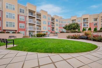 Double courtyards with lush landscaping at The Ridgewood by Windsor, 4211 Ridge Top Road, Fairfax