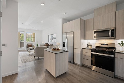 Gourmet chef-inspired kitchens, complete with quartz countertops and a luxury island at Windsor Rancho PQ in San Diego, California
