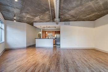 Hardwood Flooring and Exposed Concrete Ceilings at Crescent at Fells Point by Windsor, 951 Fell Street, Baltimore