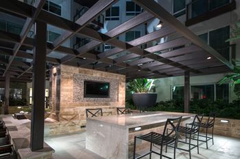 Outdoor Lounge with Grilling Space at 1000 Grand by Windsor, California, 90015