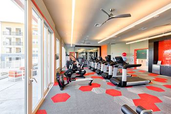 Wellness Center with Club-Quality Fitness Equipment, Spin Bikes and Yoga Studio with On-Demand Fitness Classes, at Blu Harbor by Windsor, Redwood City, CA