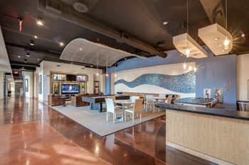 Resident Lounge with Billiards and Shuffleboard Tables at Crescent at Fells Point by Windsor, 21231, MD