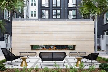 Courtyards with Gathering Spaces, Fire Pits and Hammocks, at Metro West, Plano, 75024