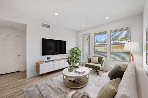 Large windows and open concept floor plans create an inviting space at Windsor Rancho PQ in San Diego, CA