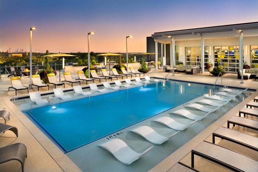 Swimming Pool with Lounge Seating at The Encore by Windsor, Georgia - Photo Gallery 1