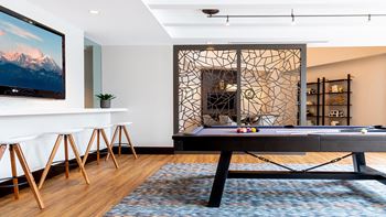 Game room with billiards at The Ridgewood by Windsor, Fairfax, Virginia