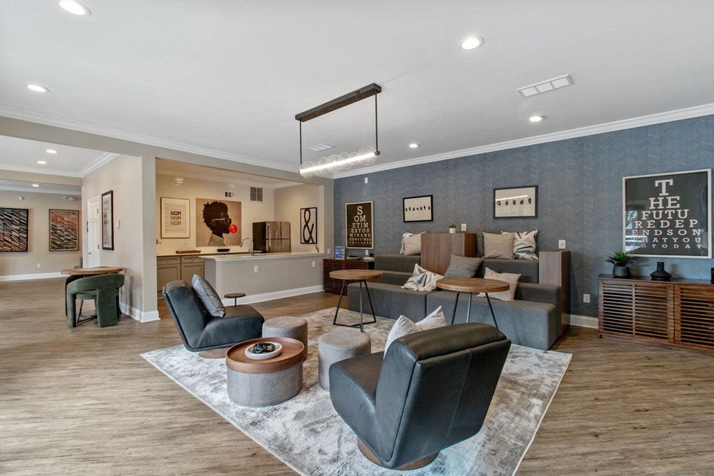 A living room with a grey sofa and a wooden coffee table.