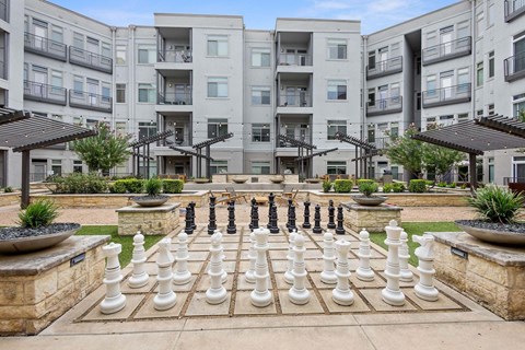 Life Size Chess Set at Eleven by Windsor 811 East 11th Street Austin, TX 78702