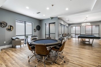Resident clubhouse game lounge featuring game table - Photo Gallery 28