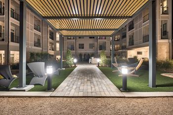 Courtyard walkway at Windsor Burnet, 10301 Burnet Rd, 78758