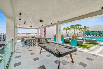 Pool table and bar at Windsor Ludlam Trail, an apartment complex in Miami, FL.