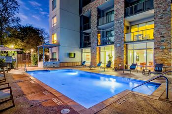Resort-style pool with tanning deck