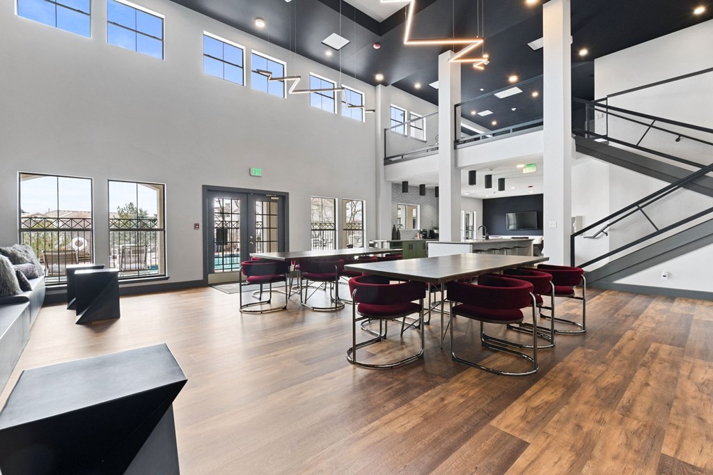 Large room with a large table and chairs in the middle of it at Windsor Westminster, Westminster, Colorado