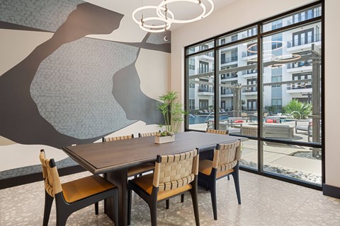 Indoor dining with poolside views at Windsor Cityline in Richardson, Texas