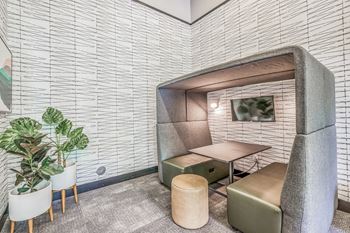 a room with a table and two chairs