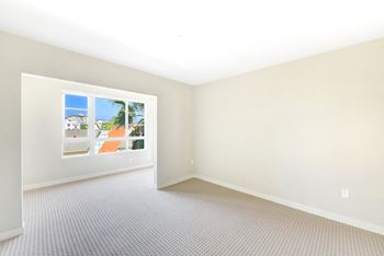 Oversized Windows With Mesh Window Blinds At 5550 Wilshire at Miracle Mile by Windsor, CA