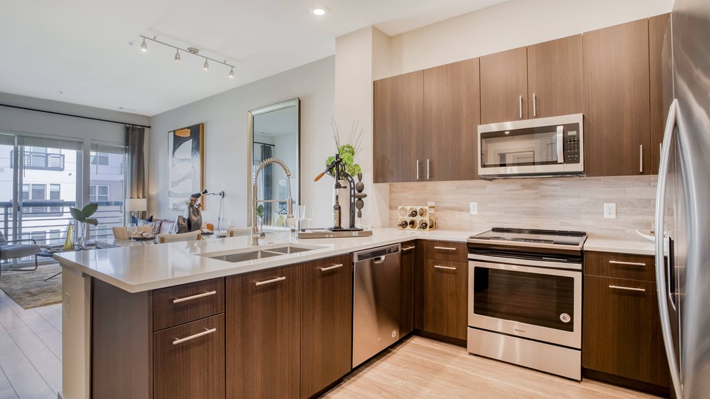 Our chef-inspired kitchens feature designer finishes and stainless steel appliances Our chef-inspired kitchens feature designer finishes and stainless steel appliances at Windsor Mystic River, Medford, Massachusetts