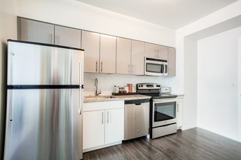 Tiled Kitchen Backsplash Tiled Kitchen Backsplash at Waterside Place by Windsor, Massachusetts, 02210 - Photo Gallery 5