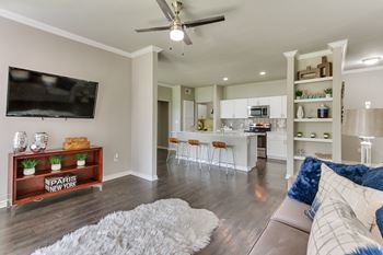 Living Room With Kitchen View at Legacy by Windsor, Plano, 75024