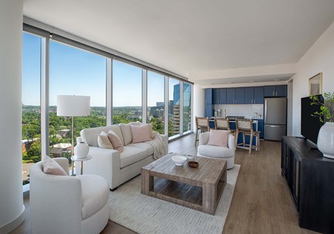 A modern living room with a view of the city.