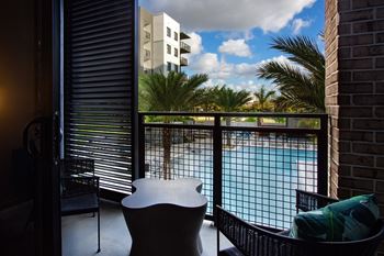 Private Balcony Overlooking Pool at Centrico by Windsor, Doral