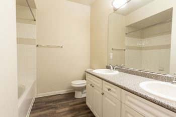 Well-lite bathrooms at Windsor at Meadow Hills, CO 80014