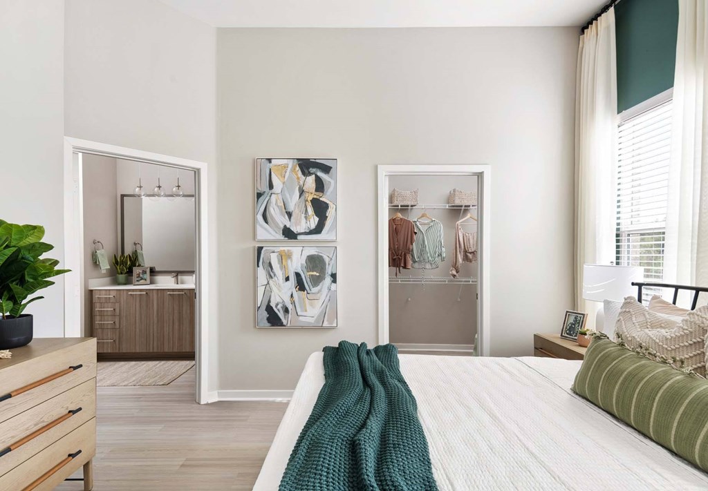Bedroom with walk-in closet at Windsor Cleartwater, Clearwater, FL 33763 Bedroom with walk-in closet at Windsor Cleartwater, Clearwater, FL 33763