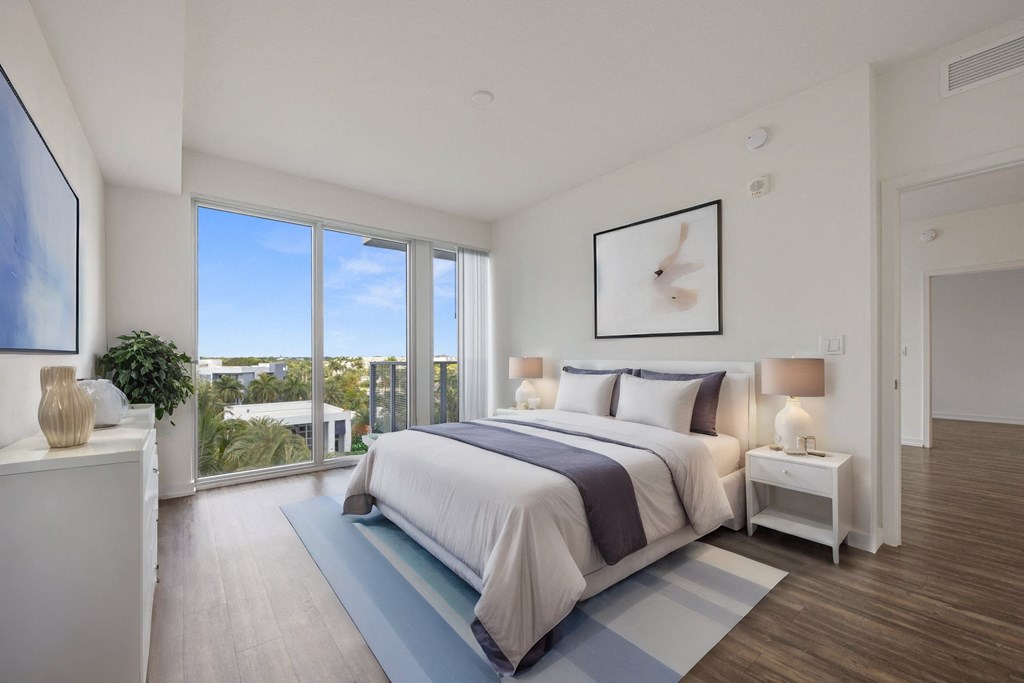 Large bedroom with oversized windows Large bedroom with oversized windows at Allure by Windsor, 33487, FL