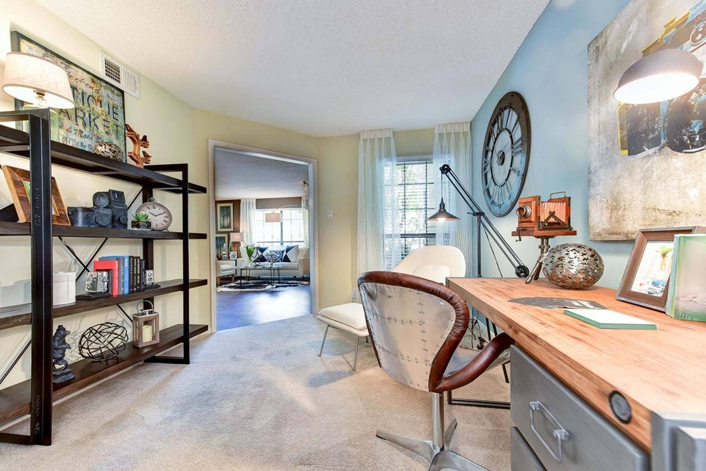Windsor Oak Creek - Spacious Den or home office with a large clock on the wall in Fairfax VA