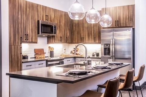 a kitchen with a counter top and a sink