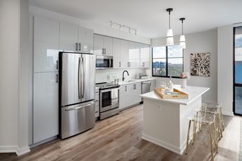 Contemporary Wood Style Flooring in Kitchen at Centrico by Windsor, Doral, Florida