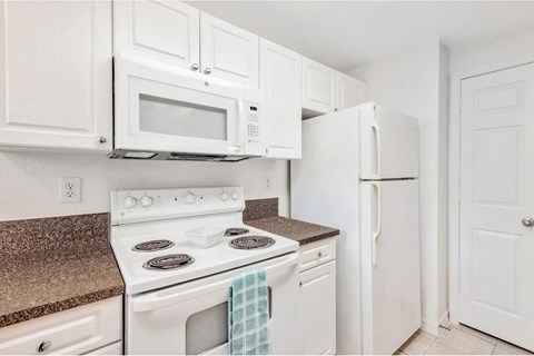 Fully equipped kitchens at Windsor Coral Springs, Coral Springs, FL