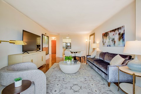 a living room with a couch and a table