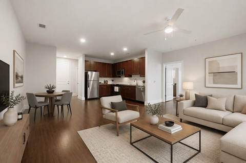 A modern living room with a dining table and chairs.