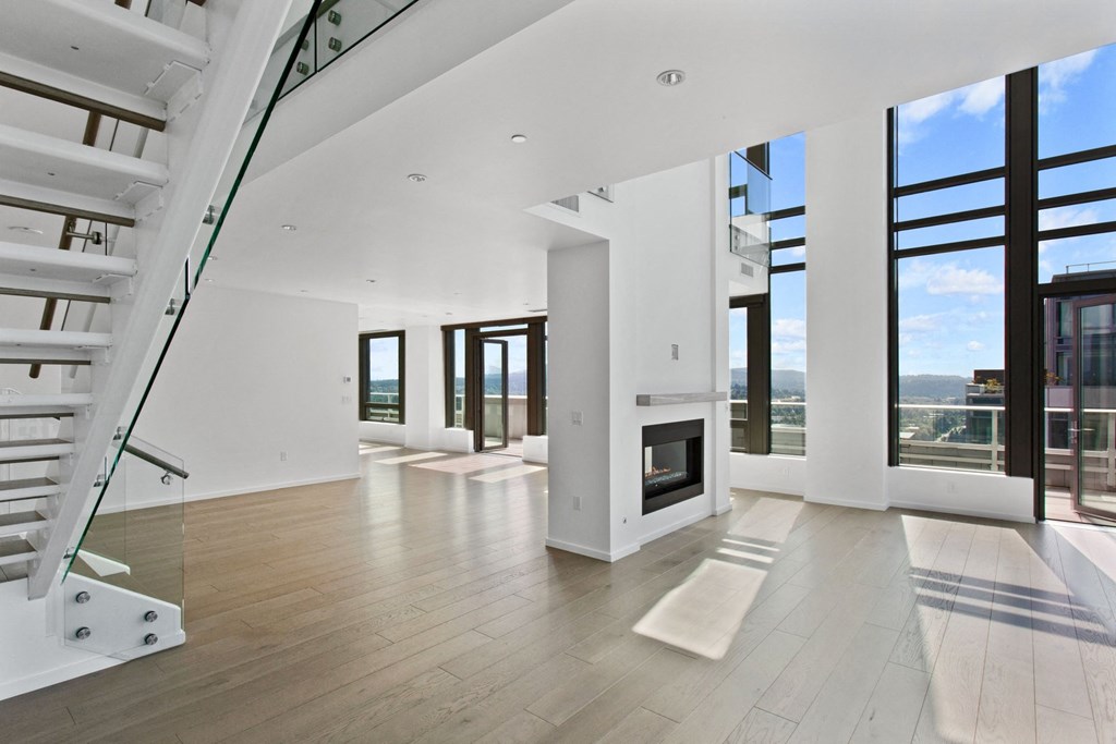 Be one of the lucky few A view of the living room from the stairs at Bravern, Bellevue, Washington