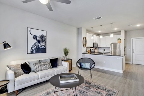 a living room with a couch and a table