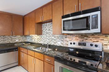 Tile backsplash in kitchen at The Monarch by Windsor, 801 West Fifth Street, 78703
