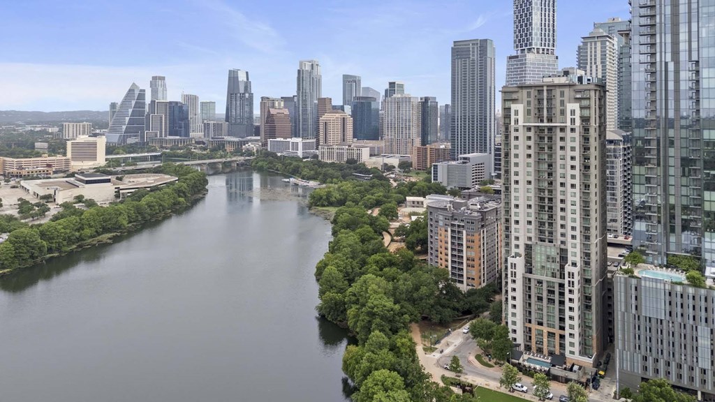 Building exterior and river view at Windsor on the Lake, 43 Rainey Street Austin, TX 78701