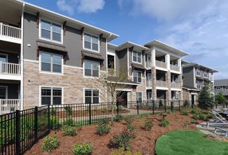 Apartment Building Exterior Apartment Building Exterior at Windsor Sugarloaf, Suwanee, GA, 30024 - Photo Gallery