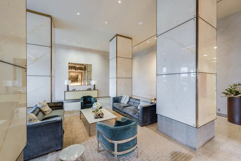 a living room with couches and a table