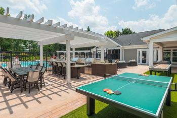 Outdoor Entertainment Space with Barbecue Grills at Windsor Herndon, Herndon, VA, 20171