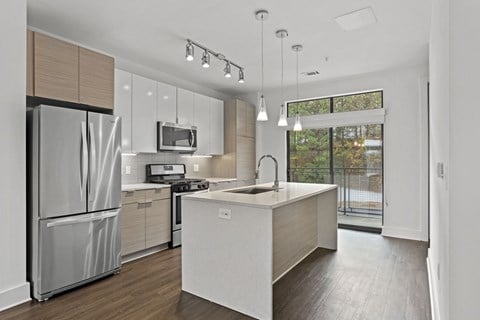 Kitchen with large island at The Encore by Windsor, Atlanta, 30339