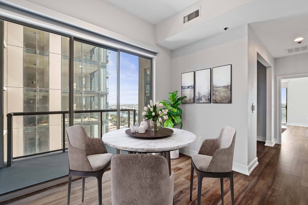 Dining area and balcony at Windsor on the Lake, 43 Rainey Street Austin, TX 78701