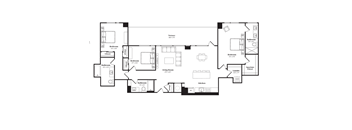 Floor plan of a spacious three-bedroom, three-bathroom apartment with an open-concept living area.