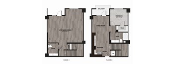 A floor plan of a two-story home with a living room, bedroom, and bathroom on the second floor and a living/work space on the first floor.