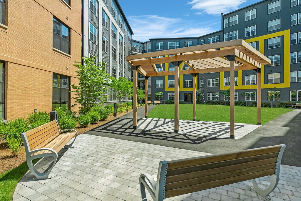 The outdoor living spaces at Edison on the Charles by Windsor, Waltham, 02453