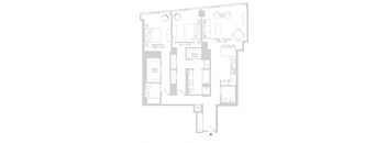 a floor plan of a house with a lot of furniture and a staircase