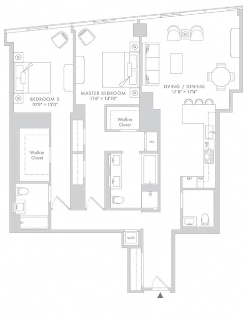 a floor plan of a house with a lot of furniture and a staircase