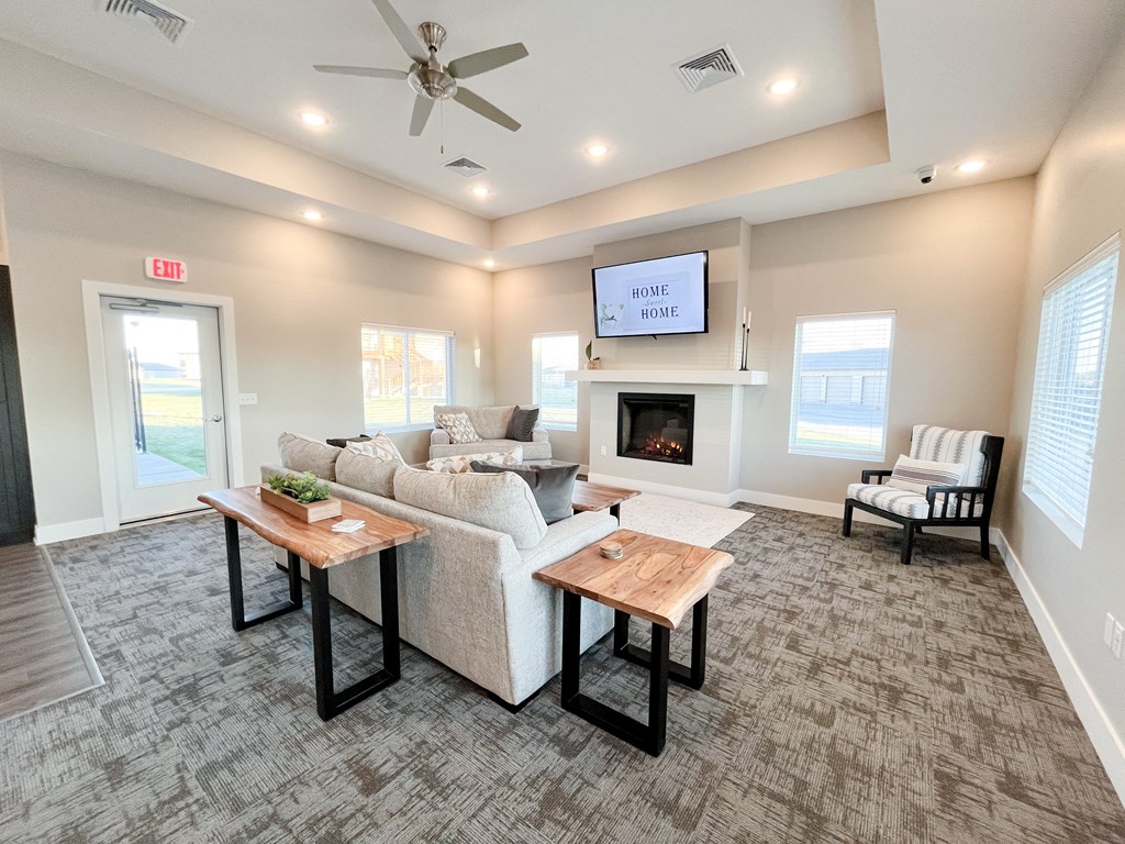 a living room with a couch and a tv