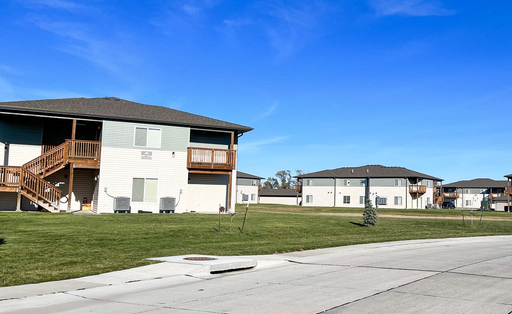 a row of houses on the side of a street